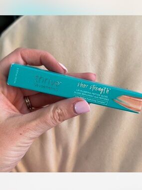 NWT Thrive causemetics Sheer Strength® Lip-Plumping Peptide Gloss in Ruth peach!